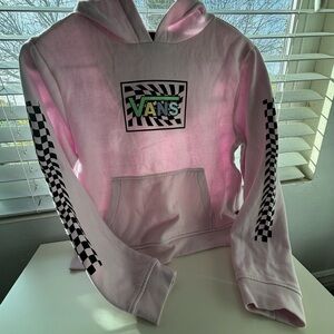 It’s a kid sweater brand, vans size, large
